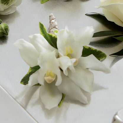 White Mini Cymbidium Boutonniere – LARRY'S FLORIST, Cliffside Park NJ